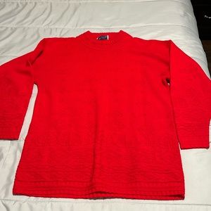 Bright red sweater